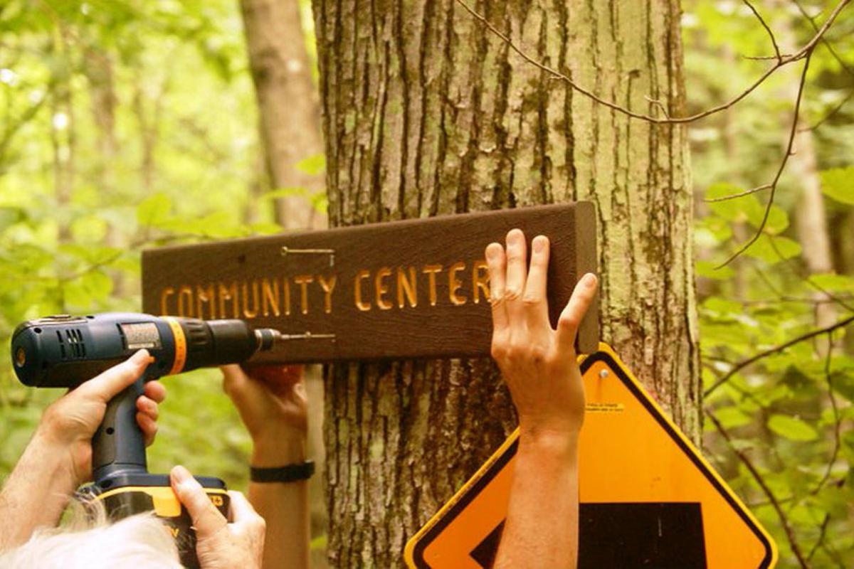 Installing Trail Signs at Community Forest